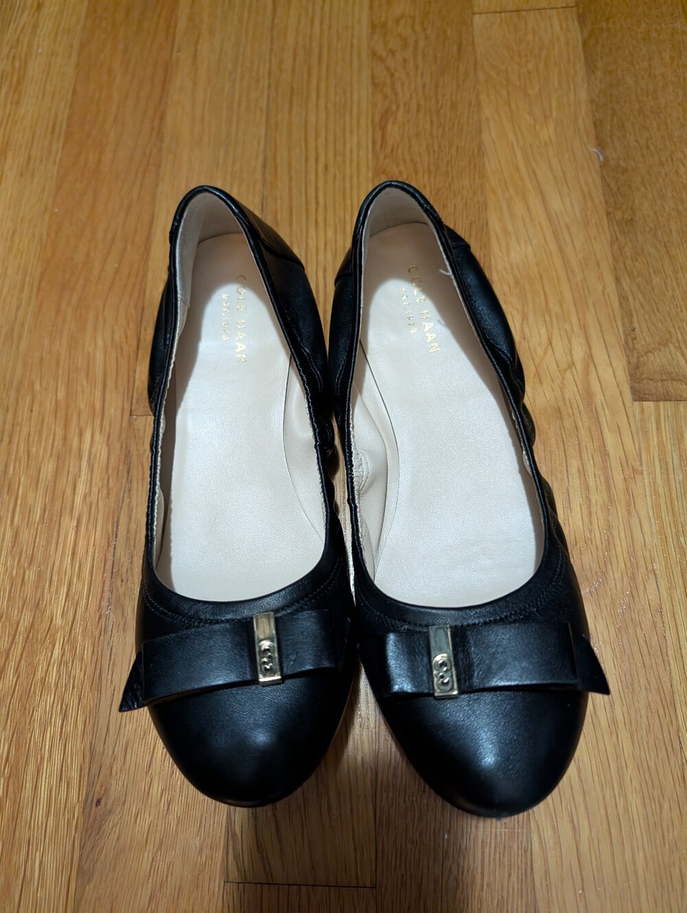 Cole Haan Black Leather Bow Flats with Gold Accent